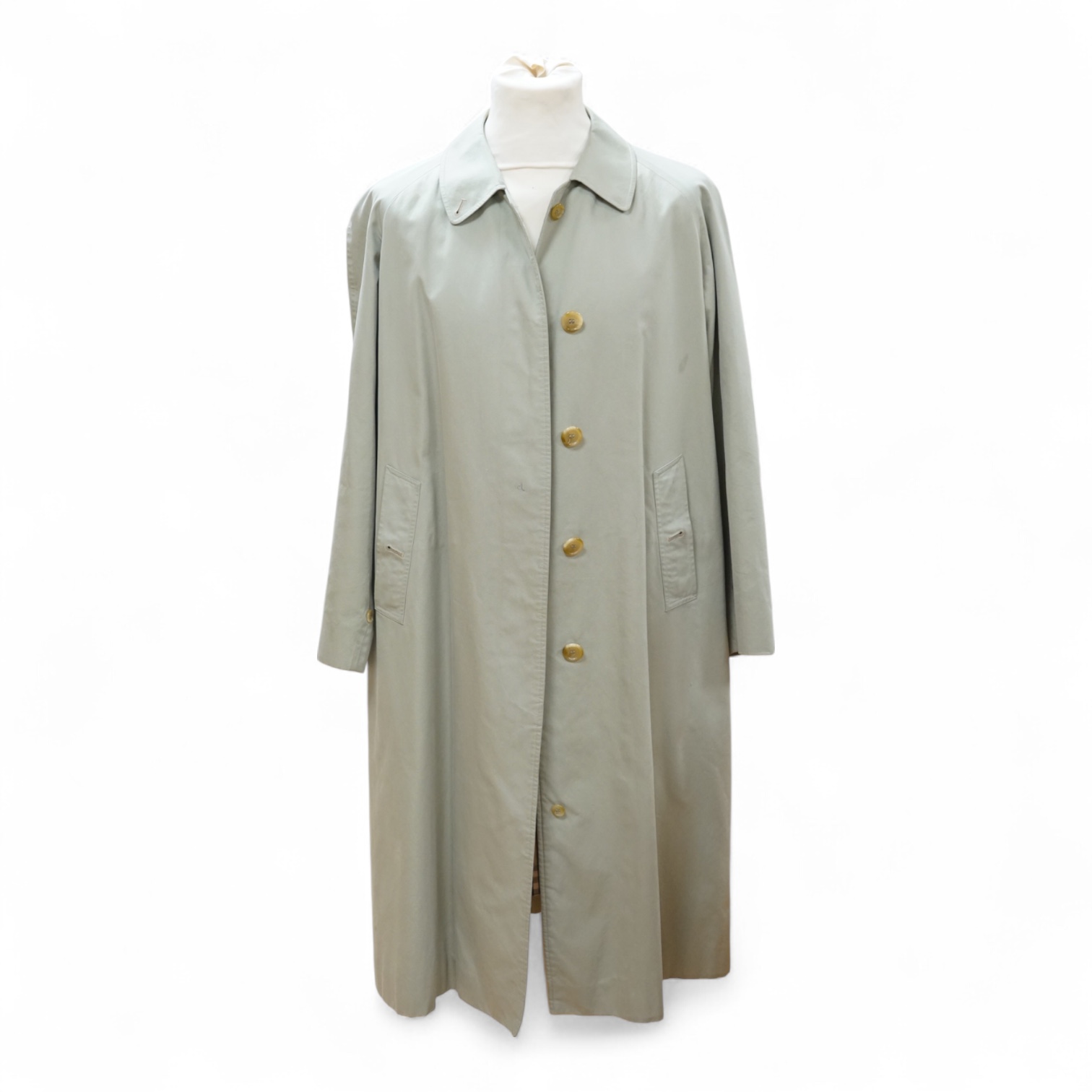 A ladies Burberry mac with check lining, size 14 Regular